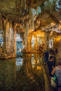 Huge stalactites and underground lake, stalactite cave, Grotta di Nettuno, Neptune Grotto, Capo