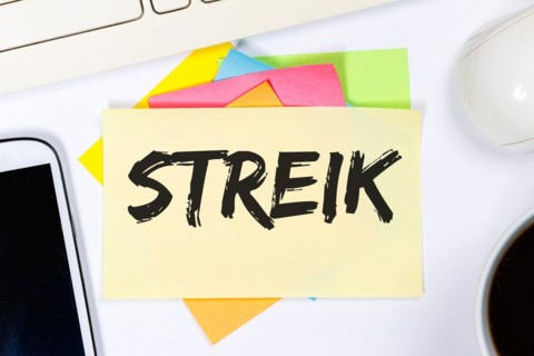 Strike strike demonstration demo protest business concept on desk in