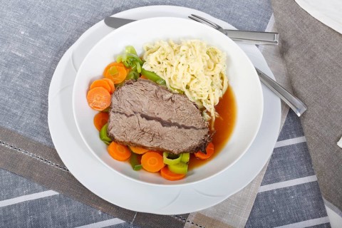 Swabian cuisine, roast beef, roast ox, herb spaetzle, meat dish, gravy, carrot vegetables, leek,