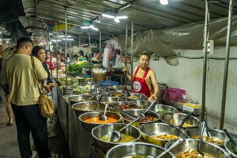 Buffet with street food at the night market in Luang Prabang, Laos, Asia