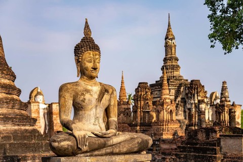 Buddha statue in the central Buddhist temple Wat Mahathat, UNESCO World Heritage Sukhothai