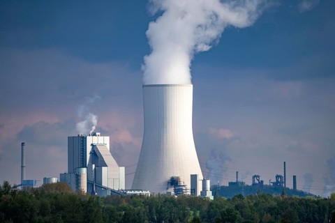 View of the STEAG coal-fired power plant Walsum, Block 10, cooling tower, parts of the Thyssenkrupp