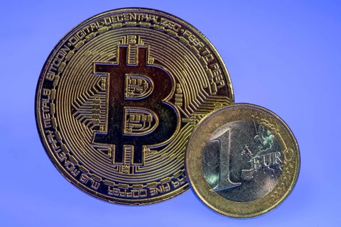 Bitcoin, cryptocurrency, symbol coin, optical placeholder for the digital currency, euro coin