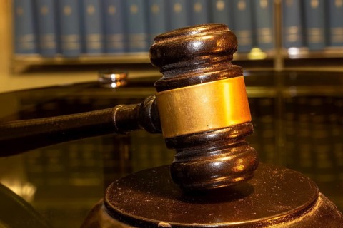 Close-up of a judge's gavel as a symbolic image for a court judgement