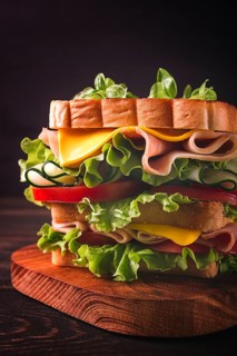 Club sandwich, on a wooden table, rustic style, close-up, no people, homemade