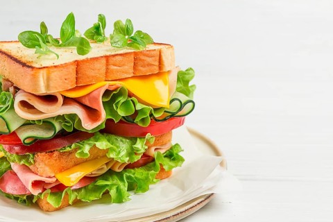 Club sandwich, on a white table, close-up, no people, horizontal, homemade