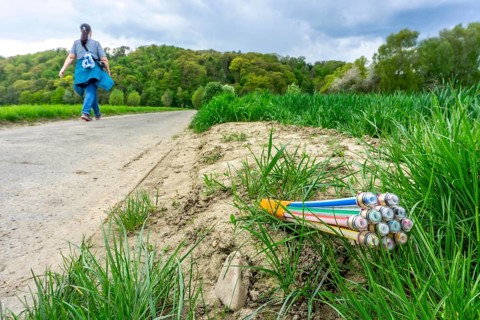 Fibre optic cable, freshly laid along a dirt road, provision of high-speed Internet in rural areas,