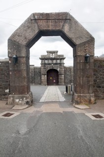 Entrance arches and doorway to Dartmoor prison, Princetown, Devon, England, UK