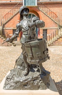 'The Drums of Fore and Aft' drummer boy sculpture by Arnold, Earl of Albemarle, Shire Hall, Market