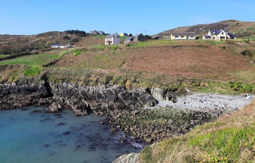South Harbour bay and houses, Cape Clear Island, County Cork, Ireland, Irish Republic, Europe