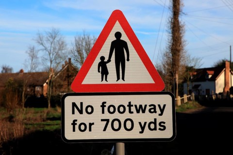 Sign in village for No footway for 700 yards, Shottisham, Suffolk, England, UK
