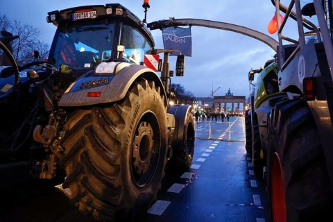 Thousands of farmers demonstrate with their tractors against the planned cancellation of the