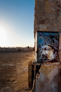 Fortress wall with picture of Jimi Hendrix, evening mood in the harbour town of Essaouira, Morocco,