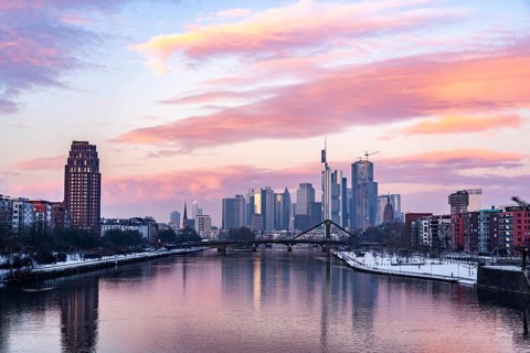 The skyline of Frankfurt am Main, skyscrapers of the banking district, Flößerbrücke, wintry