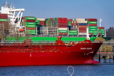 Container ship Ever Gifted, enters the port of Hamburg on the Elbe, shipping company Evergreen,