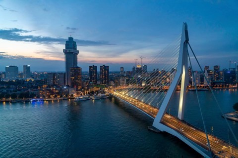 The skyline of Rotterdam, with the Erasmus Bridge over the Nieuwe Maas, Netherlands