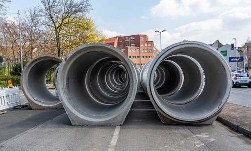 Concrete sewer pipes, stored on a construction site during sewer renovation work, on the Dickswall,
