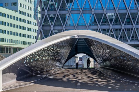 The Parkbruk, cycle and pedestrian bridge in the city centre of Antwerp, crosses a multi-lane city