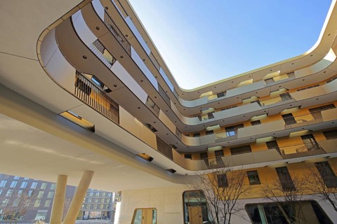 Modern golden building Pandion Doxx, golden, residential complex, inner courtyard, customs harbour,