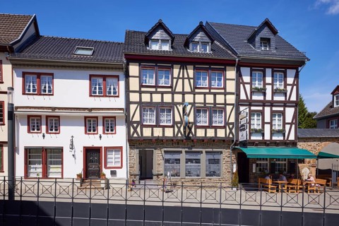Historic half-timbered houses in the pedestrian zone of the old town centre of Bad Münstereifel,