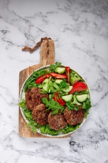 Fried cutlets, mixed minced meat, with vegetable salad, homemade, top view, no people