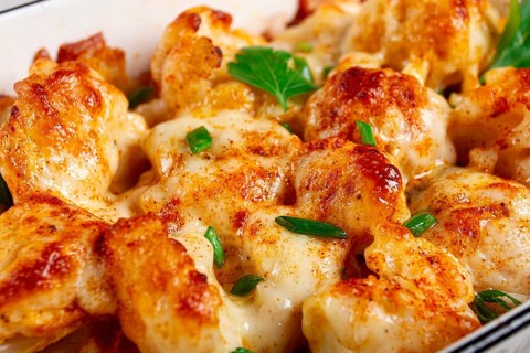 Baked cauliflower, in cream sauce, with cheese and spices, homemade, no people