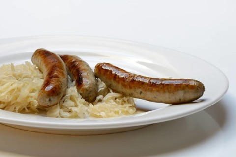 Nuremberg sausages with sauerkraut on a plate, Rostbratwurst, Germany, Europe