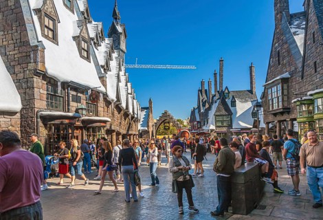 Park guests explore village of Hogsmeade in The Wizarding World of Harry Potter at Universal