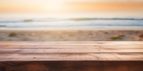 Empty wooden table with blurry beach in background. KI generiert, generiert, AI generated