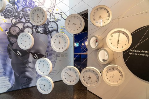 Exhibition with clocks in the interior of the Museum for Future Issues Futurium in Berlin, Germany,