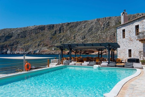 Luxurious swimming pool with sea and mountain views in glorious weather, Hotel Kyrimai,