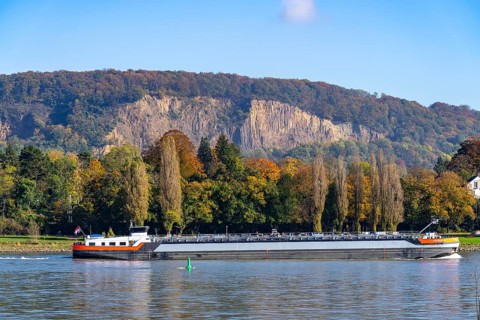 Cargo ship on the Rhine near Bonn, behind the Stingenberg quarry, site of the Oberkassl Stone Age