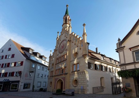 Hospital of the Holy Spirit, neo-Gothic façade, morning light, historic old town, Bad forest lake,