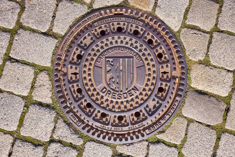Manhole cover, Dresden city coat of arms, cobblestones, Dresden, state capital, independent city,
