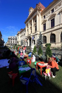 In the centre, event for children in front of the National Bank building on Lipscani Street,