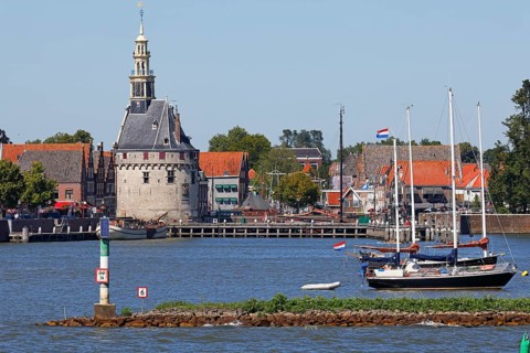 City view of Hoorn from the Markermeer, historic city centre with Hoofdtoren tower, Hoorn, North