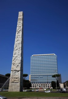 Piazza Guglielmo Marconi and Obelisco di Marconi stele and Unogas Energia Spa building, Esposizione