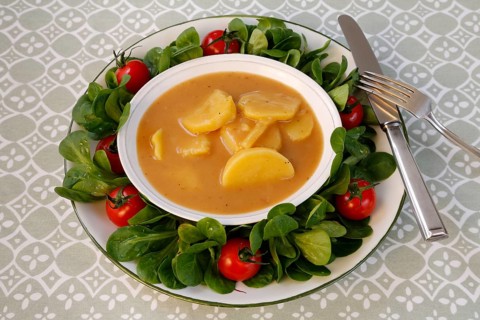 Swabian cuisine, sour potato wheels, potato slices in sour sauce, healthy cuisine, typical Swabian,