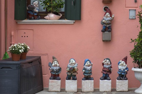 Garden gnomes in front of a house, Burano, Veneto, Italy, Europe