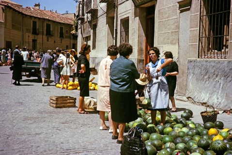 Selling watermelons and honeydew melons at the street market, Segovia, Castilla y León, Spain 1964
