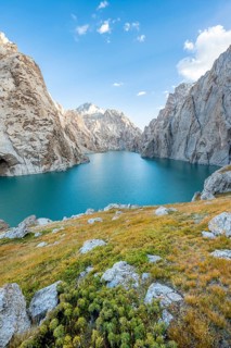 Turquoise mountain lake Kol Suu with rocky steep mountains, Kol Suu Lake, Sary Beles Mountains,