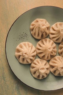 Traditional Georgian dish, Khinkali, Kalakuri, top view, rustic style, no people