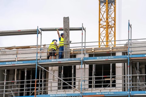 Large construction site, in Düsseldorf, construction of condominiums, shell construction,