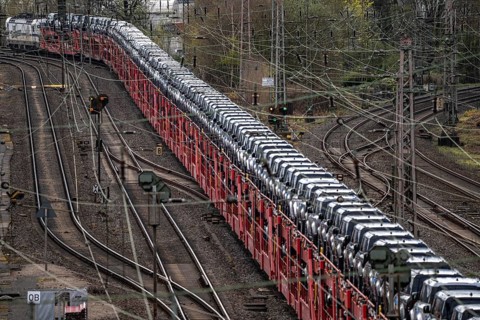 Freight train, car train with Landrover new cars on the goods train line at the Hagen-Vorhalle
