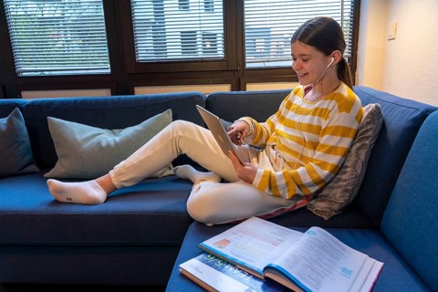 Homeschooling, girl, 11 years old, learns at home, home learning, lessons at home, distance
