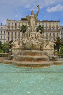 Sculptures at the Fontaine de la Fédération built in 1890, Palm trees and Grand Hotel, Statue of