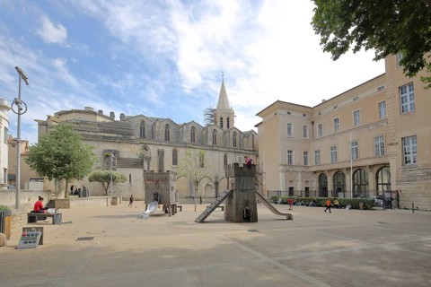 Romanesque church of St-Siffrein and children's playground, Saint, Carpentras, Vaucluse, Provence,
