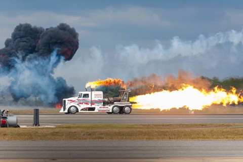 Kent Shockley performs his jet truck ground show during air show at NAS Jacksonville, Florida, USA,