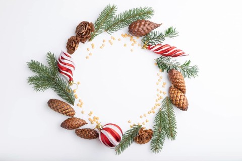Christmas or New Year wreath composition. Decorations, balls, cones, fir and spruce branches, on