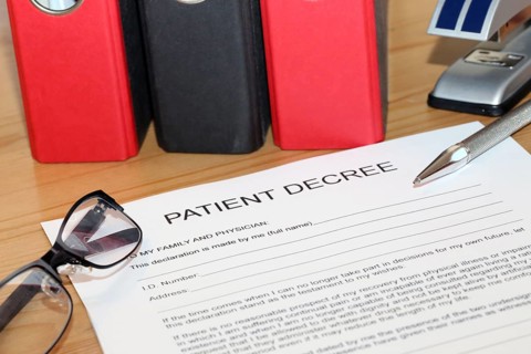 Symbolic image: Healthcare proxy, living will in English on a desk